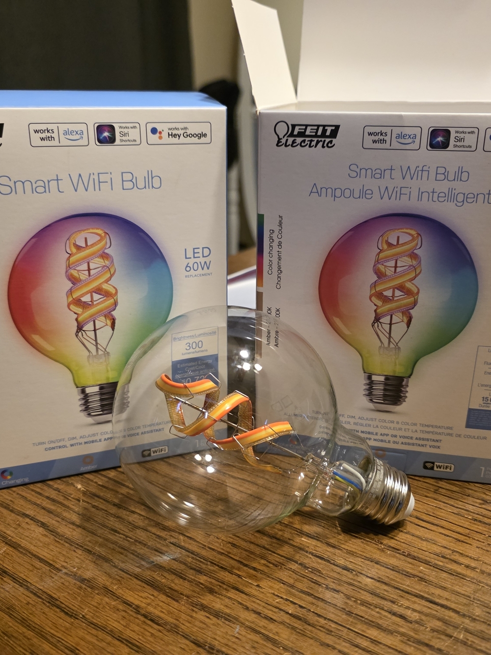 FEIT Clear Globe Smart WiFi Bulb with Orange Spiral Filament